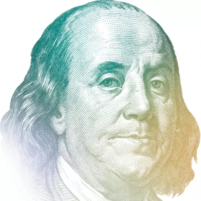 Watermark image of Benjamin Franklin's face, where the ink shifts in color from blue to green to yellow as you move from left to right.