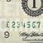 número de serie verde del billete de cinco dólares