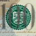 sello del Tesoro y pluma