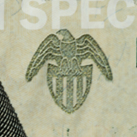 águila azul con el escudo