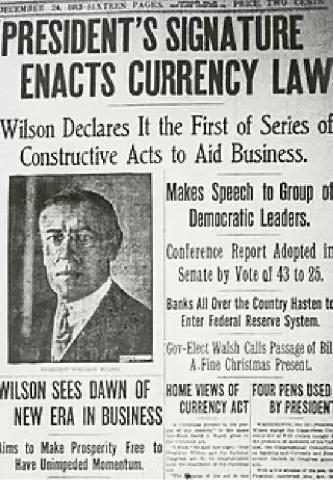 “President’s signature enacts currency law,” newspaper clipping