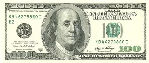 front of the $100 note